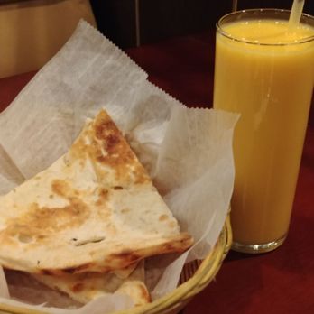 Utsav Indian Cuisine - Fresh hot Naan and a cool mango lassie - Indian Near Me - Wethersfield, Connecticut Utsav Indian Cuisine - Fresh hot Naan and a cool mango lassie - Indian Near Me - Wethersfield, Connecticut