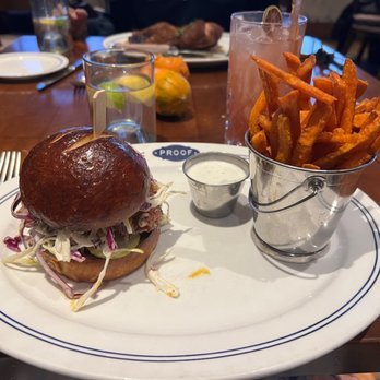 Proof - Smoked pulled pork sandwich (btw it's smoked on sight and it smells amazing) - American Near Me - Scottsdale, Arizona Proof - Smoked pulled pork sandwich (btw it's smoked on sight and it smells amazing) - American Near Me - Scottsdale, Arizona