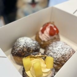 Le Le Choux - Mango Choux ($6), Strawberry Choux ($6), Original Choux w/ vanilla filling ($5), Chocolate Choux w/ chocolate filling ($5)