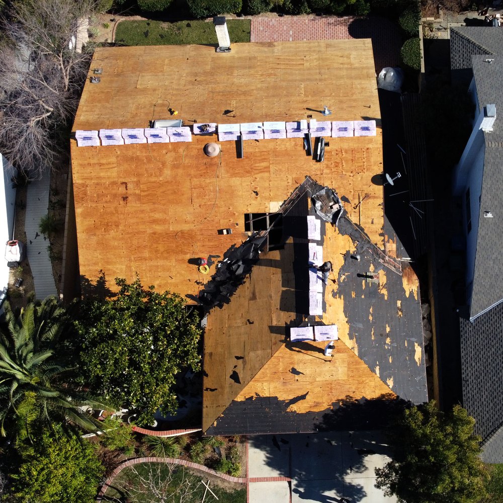 Slide of Mega Roofing