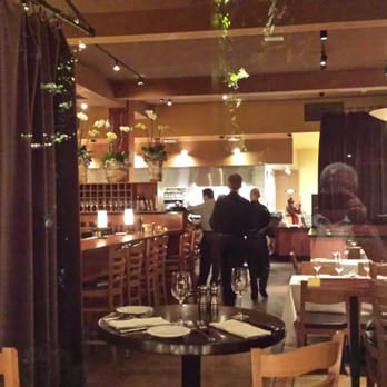 Insalata's - Interior is comfortable, open but warm, nicely lit, with a small bar area. Open kitchen area allows viewing of chef and plating - Mediterranean Near Me - San Anselmo, California Insalata's - Interior is comfortable, open but warm, nicely lit, with a small bar area. Open kitchen area allows viewing of chef and plating - Mediterranean Near Me - San Anselmo, California