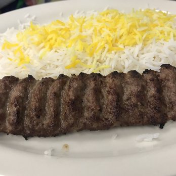 Middle East Market - Koobideh Skewer on a bed of rice. - Grocery Near Me - Berkeley, California Middle East Market - Koobideh Skewer on a bed of rice. - Grocery Near Me - Berkeley, California