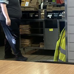 McDonald's - The lady with the bag ready I ask a couple times for my order and she said she waiting for some fries but she had fries before!!!