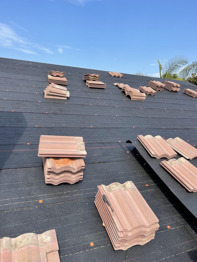 Slide of Green Ladder Roofing