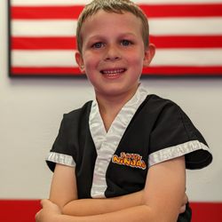 The Rock Martial Arts & Fitness - Connor earned his Little Champion belt!