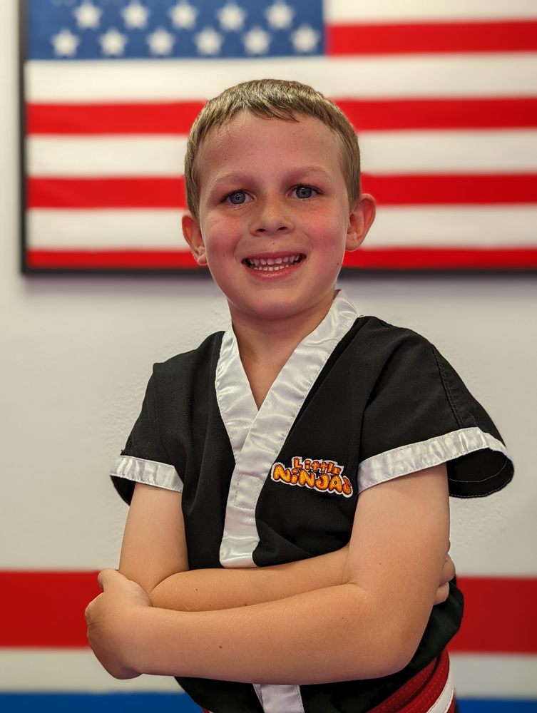 The Rock Martial Arts & Fitness Logo