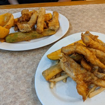 Farmer Boys - Two fish-and-chips dinners. Half fries and half fried zucchini on one, half onion rings and half fried zucchini on the other. - Burgers Near Me - Rancho Cucamonga, California Farmer Boys - Two fish-and-chips dinners. Half fries and half fried zucchini on one, half onion rings and half fried zucchini on the other. - Burgers Near Me - Rancho Cucamonga, California