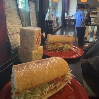 Home Slice Pizza - Counter seating.  This sub is amazing! - Pizza Near Me - Austin, Texas