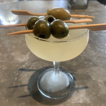 Herringbone Waikiki - Titos Dirty Martini with extra extra olives - Seafood Near Me - Honolulu, Hawaii Herringbone Waikiki - Titos Dirty Martini with extra extra olives - Seafood Near Me - Honolulu, Hawaii