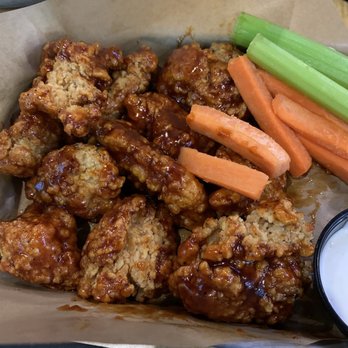 Buffalo Wild Wings - Boneless wing barely tossed in sauce - Sports Bars Near Me - Bakersfield, California
