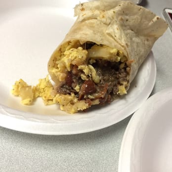 Pepe's - Breakfast burrito with carne asada with rice and green sauce - Mexican Near Me - Fullerton, California