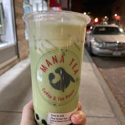 Thai green tea with boba and salted cream Thai green tea with boba and salted cream