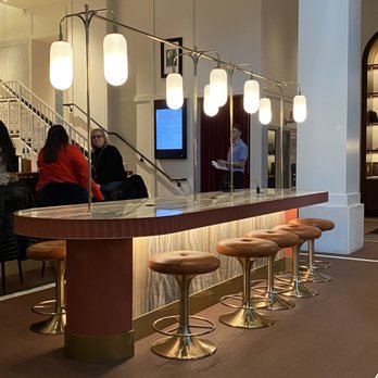 Depot 226 - a bar with stools and a television - Coffee & Tea Near Me - Chicago, Illinois