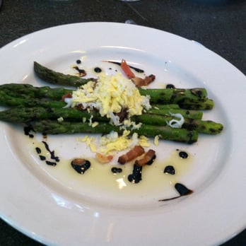 Roots Restaurant and Bar - Grilled Asparagus with Olive Oil, Balsamic, Egg and Pancetta - New American Near Me - Camas, Washington Roots Restaurant and Bar - Grilled Asparagus with Olive Oil, Balsamic, Egg and Pancetta - New American Near Me - Camas, Washington