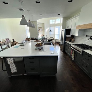 JVC Construction & Remodeling - a kitchen with a center island - General Contractors Near Me - Austin, Texas
