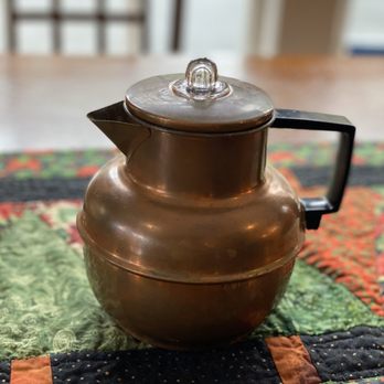The Corner Cup - a teapot on a quilt - Bakeries Near Me - Jonesborough, Tennessee