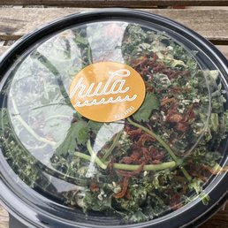 a salad in a plastic container