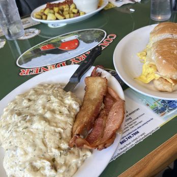 The Country Diner - Half order of biscuits and gravy, their famous thick cut bacon, which is cut in house, and their western breakfast sandwich. - Diners Near Me - Enfield, Connecticut