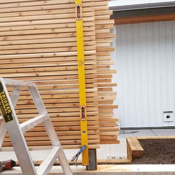 Climate Custom Decks - Wood fence in progress, carefully levelled for a clean and precise finish. - General Contractors Near Me - North Vancouver, British Columbia