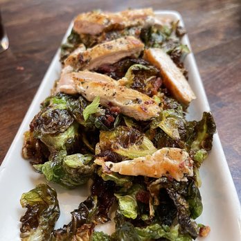 Parma Tavern - a plate of brussel sprouts and chicken - Italian Near Me - Buford, Georgia Parma Tavern - a plate of brussel sprouts and chicken - Italian Near Me - Buford, Georgia
