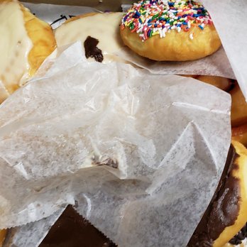 Jack's Donuts - sloppy mess of donuts thrown in the box with 5 different tissues stuck to the donuts - Donuts Near Me - Indianapolis, Indiana Jack's Donuts - sloppy mess of donuts thrown in the box with 5 different tissues stuck to the donuts - Donuts Near Me - Indianapolis, Indiana