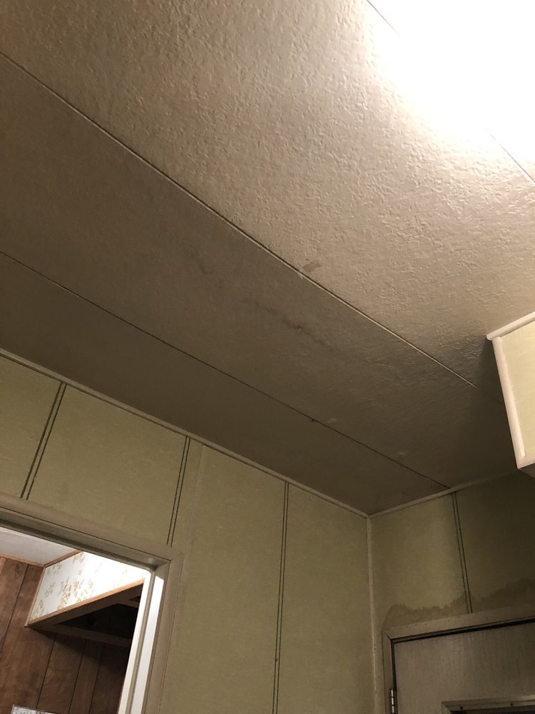 Slide of TMH Roofing