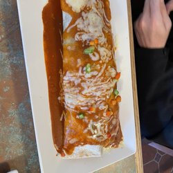 Toto's Mexican Restaurant - Gigantic and delicious burrito!!!This burrito has a good mix of veggies, soft grilled chicken breast and refried beans.