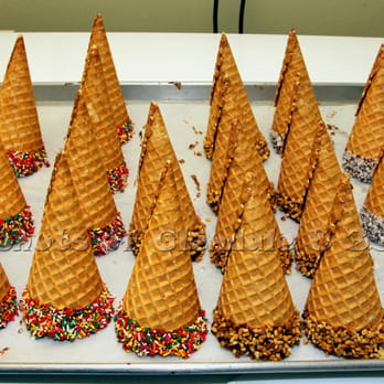 Bosa Donuts - a tray of ice cream cones with sprinkles - Donuts Near Me - Phoenix, Arizona