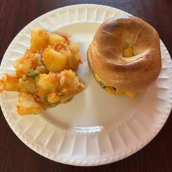 Bamboo Café - Bacon, egg, cheese bagel, a side of potatoes, and a can of Diet Coke (not pictured) for 10 bucks.
