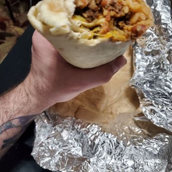 American Taco Company - Ground beef burrito with Spanish rice, and cheddar cheese - Mexican Near Me - Rolla, Missouri American Taco Company - Ground beef burrito with Spanish rice, and cheddar cheese - Mexican Near Me - Rolla, Missouri