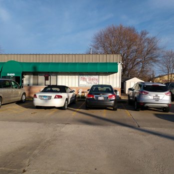 Fillin Station - cars parked in a parking lot - American Near Me - Washington, Illinois Fillin Station - cars parked in a parking lot - American Near Me - Washington, Illinois