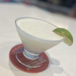 Goats Arena Sports Bar - Complimentary key lime pie martini. The super sweet bartender needed a Guinea pig! "Im your huckleberry!" I'll order this next time!