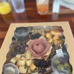 Meat, cheeses, nuts, olives and fruits for a great beach snack