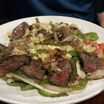 Front Row Pizzeria - Steak tip and rice pilaf dinner. Added peppers and onions. Hes a picky eater and said everything was good. - Pizza Near Me - Exeter, New Hampshire