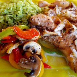 Restaurant San Javier - Fresh fish with garlic sauce, cilantro poblano rice and sauteed peppers and onion