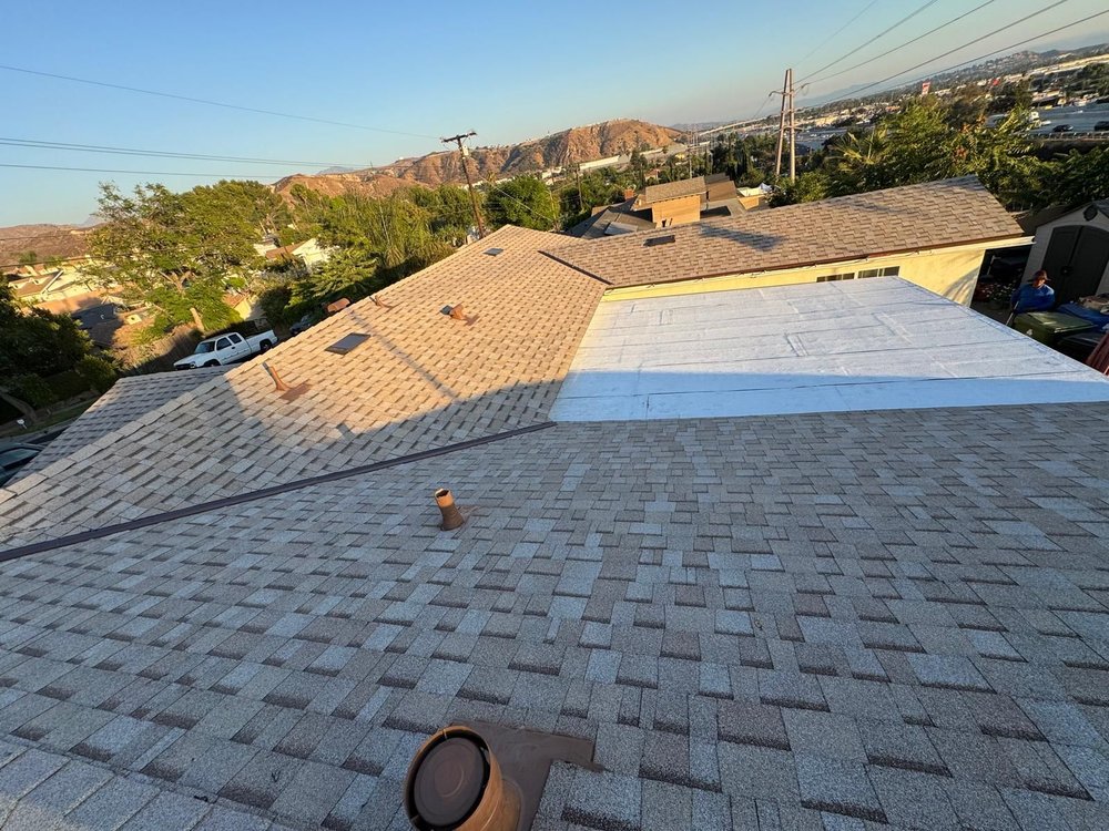 Slide of Rescue Roofing Construction