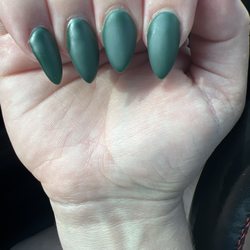 Purity Nail & Spa - Middle nail substantially shorter than other.