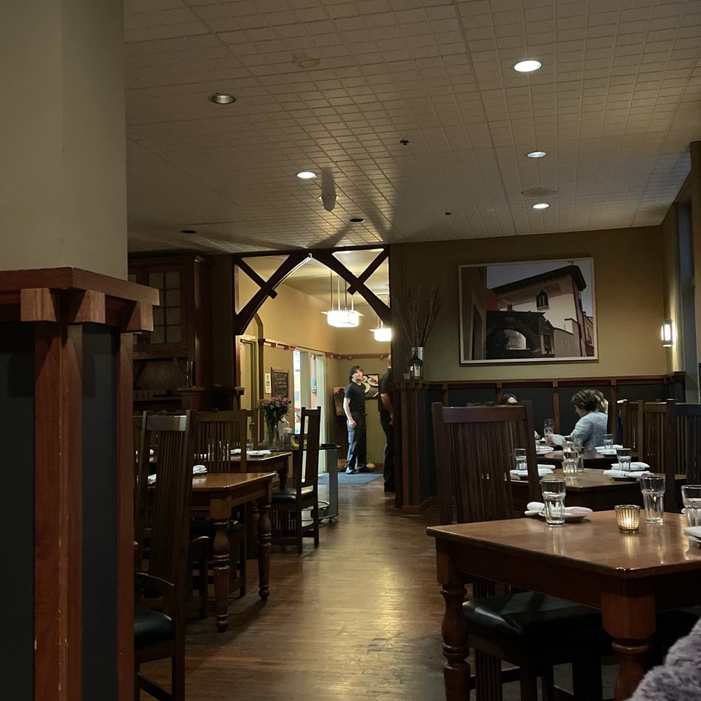 Gola Osteria - a dining area with tables and chairs - Italian Near Me - Ithaca, New York
