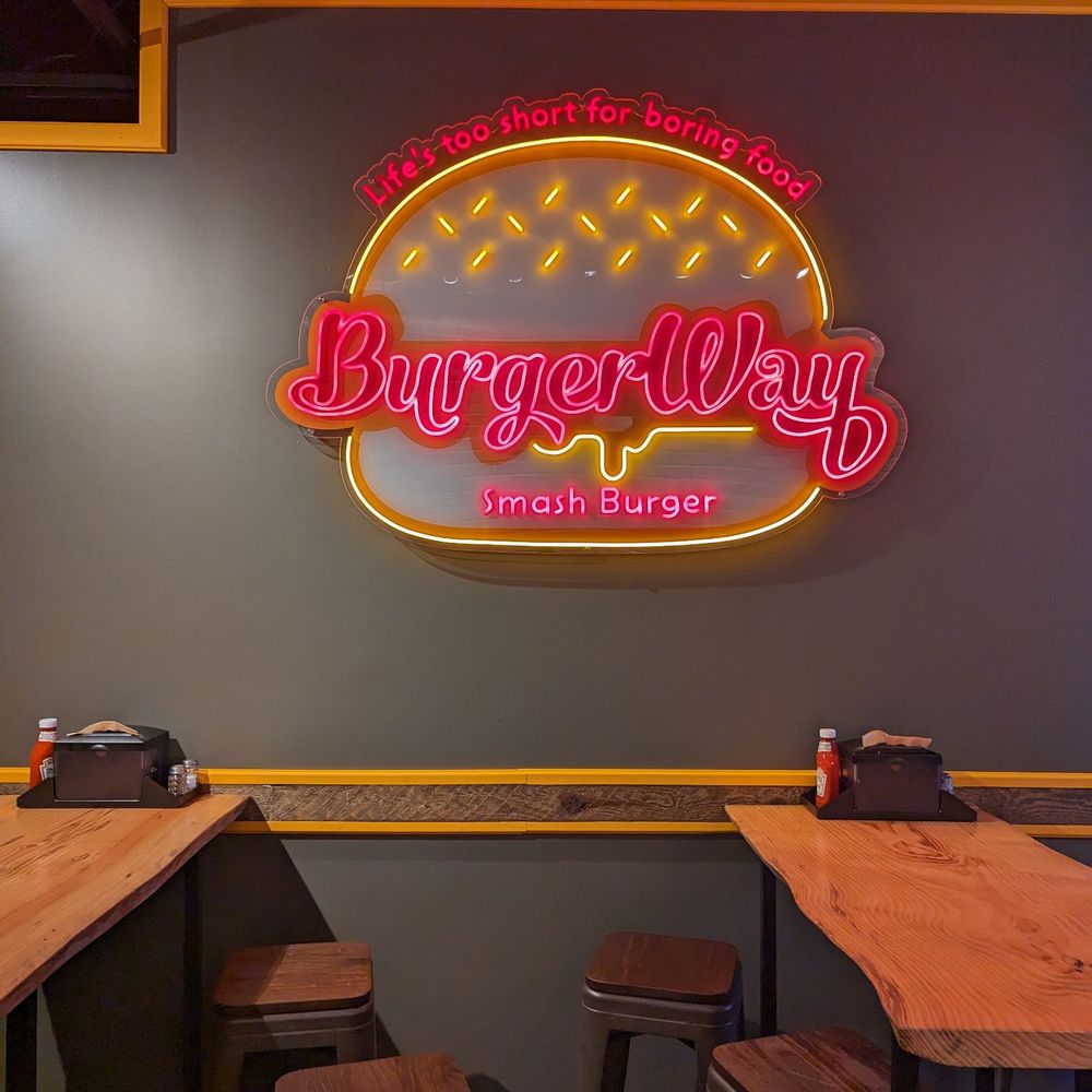 a neon sign in a restaurant a neon sign in a restaurant
