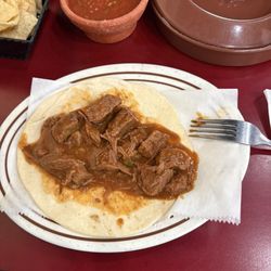 Jalisco Restaurant - Small Carne Guisada Taco missing lettuce, tomato and onion per the printed menu!