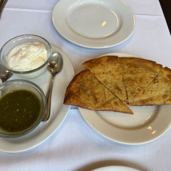 Kabul Afghan Cuisine - Spicy Green chutney and Yogurt dip served with Bulanee Katchalu - Afghan Near Me - Sunnyvale, California Kabul Afghan Cuisine - Spicy Green chutney and Yogurt dip served with Bulanee Katchalu - Afghan Near Me - Sunnyvale, California