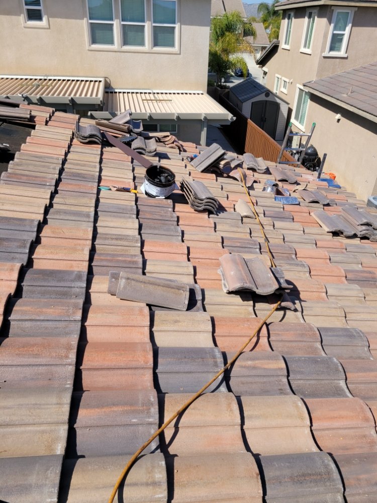 Slide of Lopez Roofing