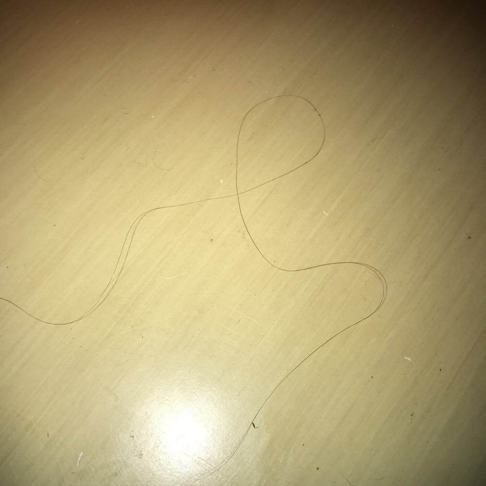 a pair of scissors on a table a pair of scissors on a table