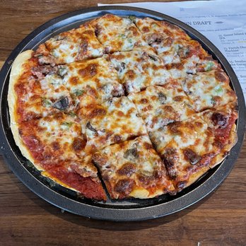 Hillary's Chicago Pizza - This is the thin crust or what is referred to as "tavern-style"...sausage, onions, green peppers...it was sooo good. - Pizza Near Me - Augustine, Florida Hillary's Chicago Pizza - This is the thin crust or what is referred to as "tavern-style"...sausage, onions, green peppers...it was sooo good. - Pizza Near Me - Augustine, Florida