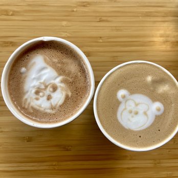 Leon Coffee House - Mexican mocha (espresso with cinnamon and chocolate + milk) and a cappuccino -- featuring the Grinch and a monkey! - Coffee & Tea Near Me - Seattle, Washington