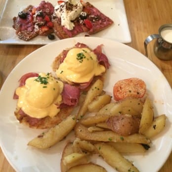 Early Bird - Tradition eggs Benedict with skillet potatoes, patriot waffle in the back - New American Near Me - Fullerton, California Early Bird - Tradition eggs Benedict with skillet potatoes, patriot waffle in the back - New American Near Me - Fullerton, California