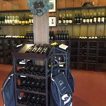 Vieni Estates - a cart of wine bottles - Wineries Near Me - Beamsville, Ontario Vieni Estates - a cart of wine bottles - Wineries Near Me - Beamsville, Ontario