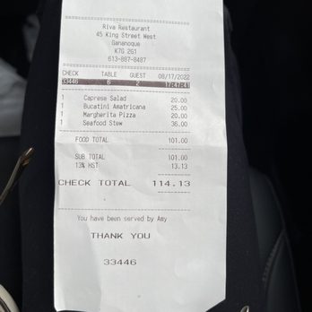 Riva - a receipt for a car with a check - Italian Near Me - Gananoque, Ontario