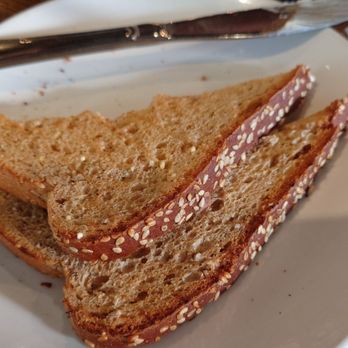 Another Broken Egg Cafe - Multigrain toast - American Near Me - Orlando, Florida Another Broken Egg Cafe - Multigrain toast - American Near Me - Orlando, Florida