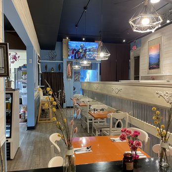 Momo's Master - Indoor seating, a lot more seating behind the divider on the right - Himalayan/Nepalese Near Me - Chapel Hill, North Carolina